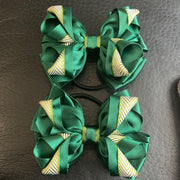 Luxury Bows: Emerald green bows with hunter green detailing