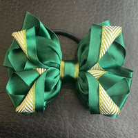 Luxury Bows: Emerald green bows with hunter green detailing