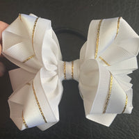 Luxury Bows: White and gold twist bows