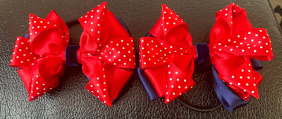 Luxury Bows: Red and navy satin flower design with polka dot & velvet centre