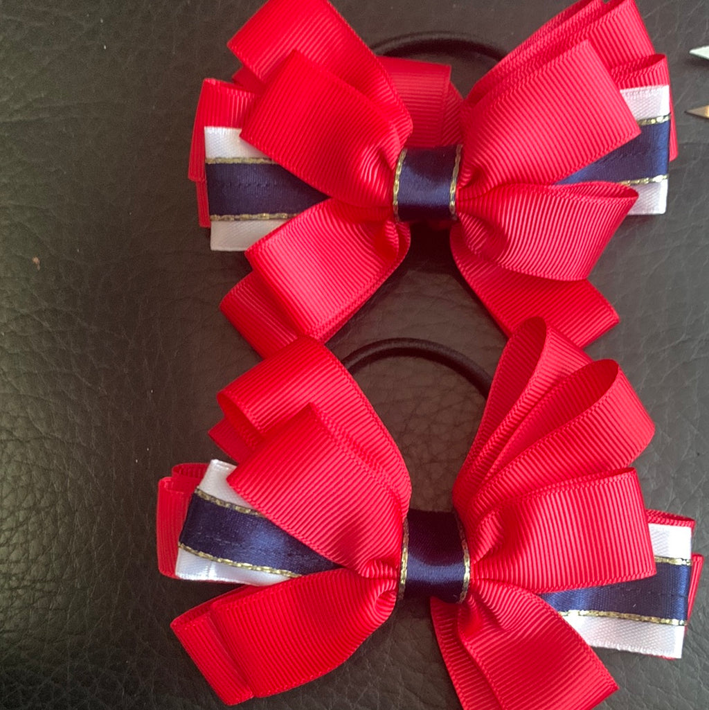 Luxury Bows: Rich red navy, gold and white bows